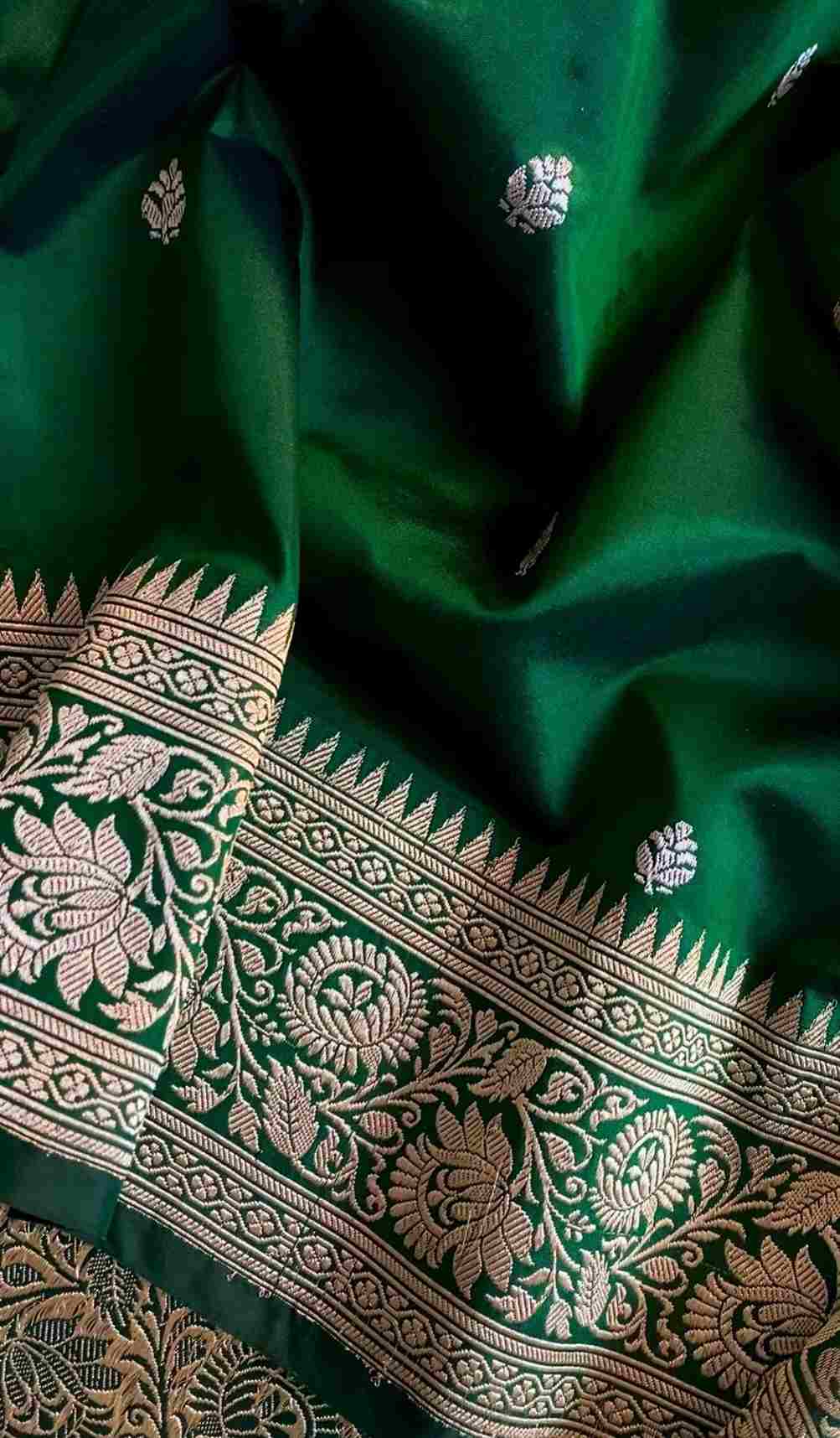 A lustrous Green saree